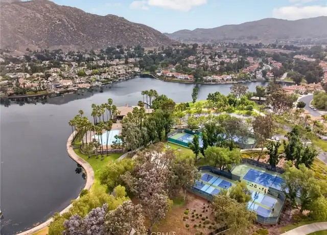 Aerial view of Sunnymead Ranch's lake, clubhouse, and Lake Club courts