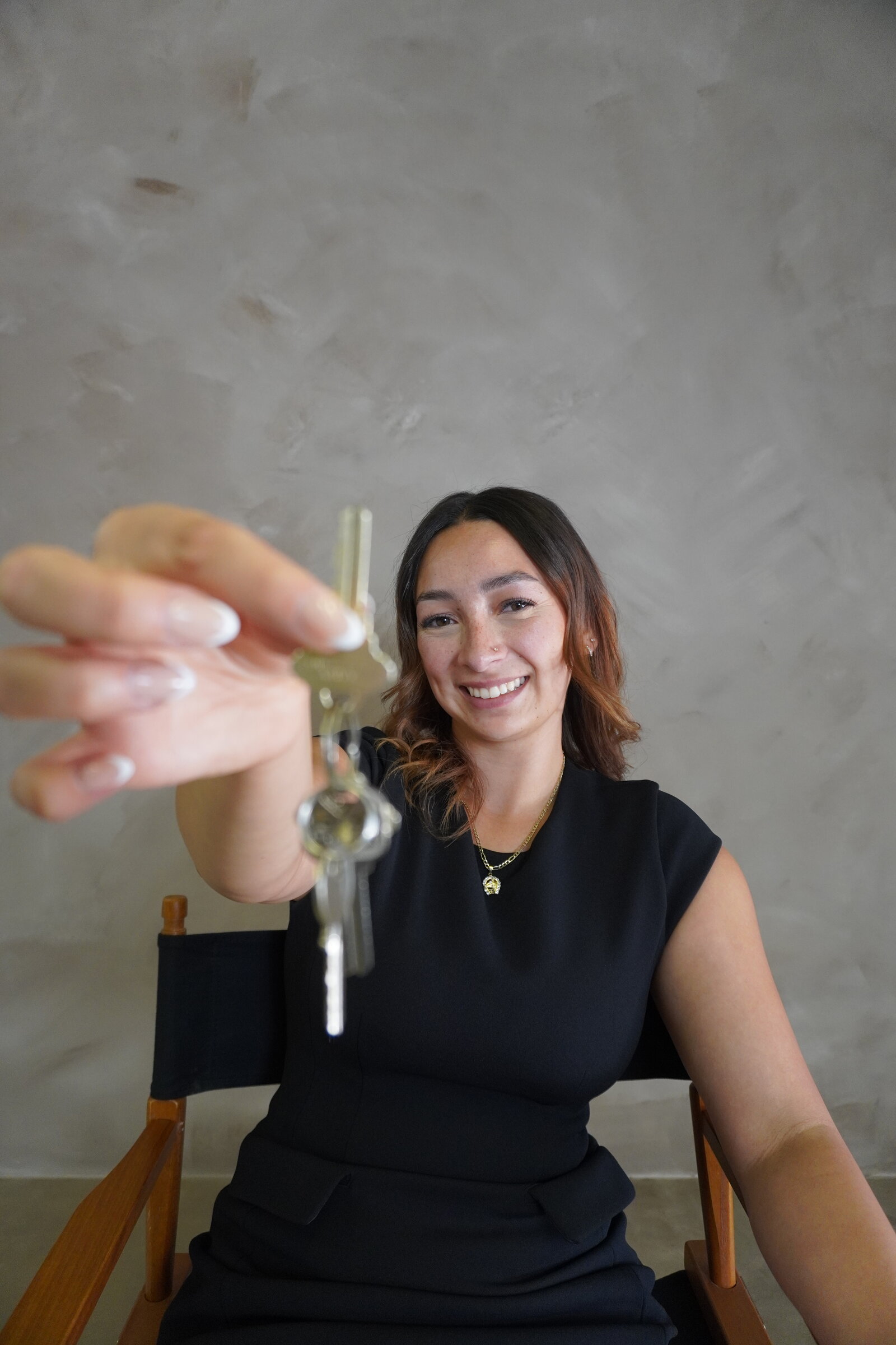 Haylee Stansberry with the keys to a new home